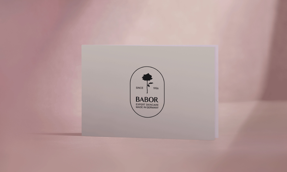 Kosmetik-Gutschein mit BABOR-Logo auf rosa Hintergrund.